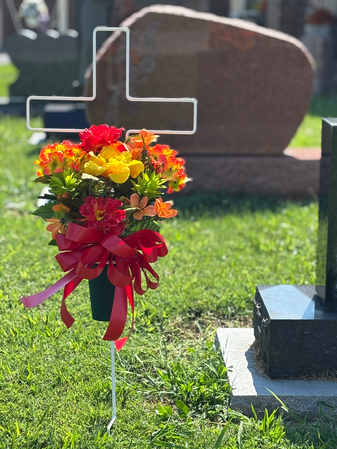 Golden Meadow Memorial Ground Vase Arrangement (Red Zinnias, Yellow Hibiscus, Green Oriental Gingers & Yellow/Orange Freesias)